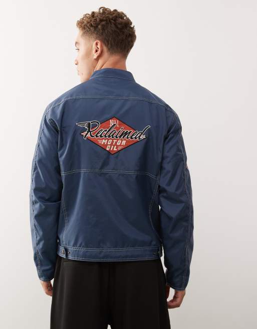Reclaimed Vintage Unisex nylon moto jacket with logo badges and embroidery in ink blue