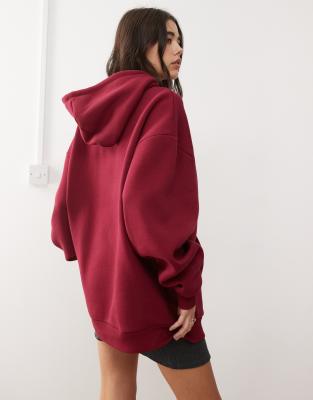 Reclaimed Vintage unisex oversized hoodie with spray print in burgundy