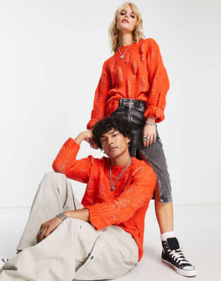Reclaimed Vintage unisex oversized jumper with laddering and distressing in orange