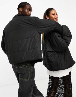 Reclaimed Vintage unisex oversized puffer bomber jacket in black