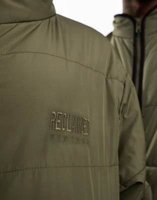 Reclaimed Vintage unisex oversized puffer bomber jacket in khaki