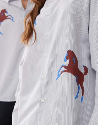 Reclaimed Vintage unisex oversized shirt in pinstripe with horse print