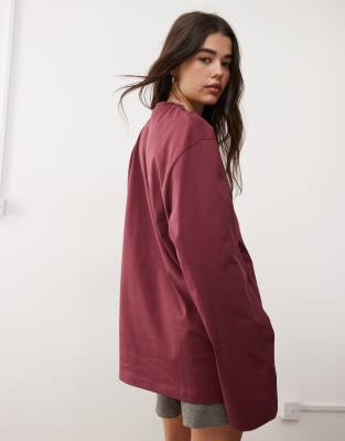 Reclaimed Vintage unisex oversized skater long sleeve t-shirt in washed burgundy