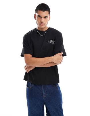 Reclaimed Vintage unisex oversized t shirt with back casino print in black