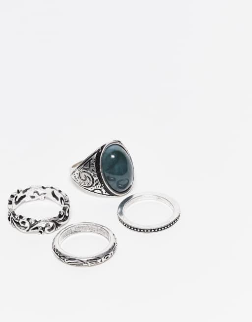 Reclaimed Vintage - Unisex - Pakke med 4 sølvfarvede ringe med imiteret smaragdsten