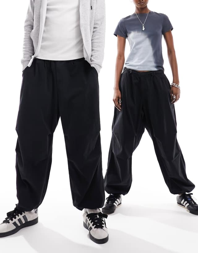 Reclaimed Vintage unisex parachute cargo pants in black 1