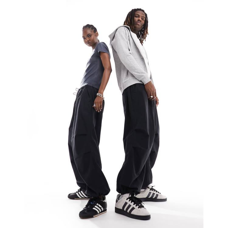 Reclaimed Vintage unisex parachute cargo trousers in black ASOS