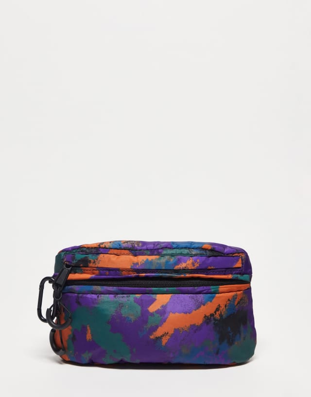 Reclaimed Vintage unisex puffer fanny pack in camo print