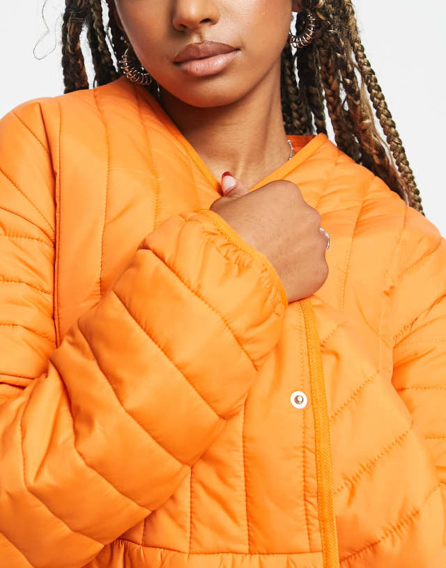 Reclaimed Vintage unisex quilted liner jacket in orange color 1