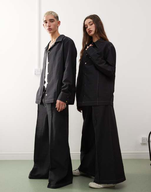 Reclaimed Vintage unisex set in black nylon with contrast stitch