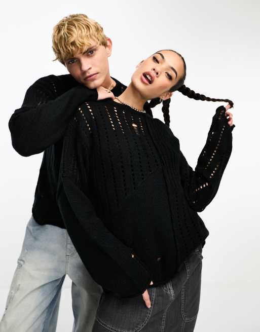Reclaimed Vintage unisex spliced laddered knit sweater in black