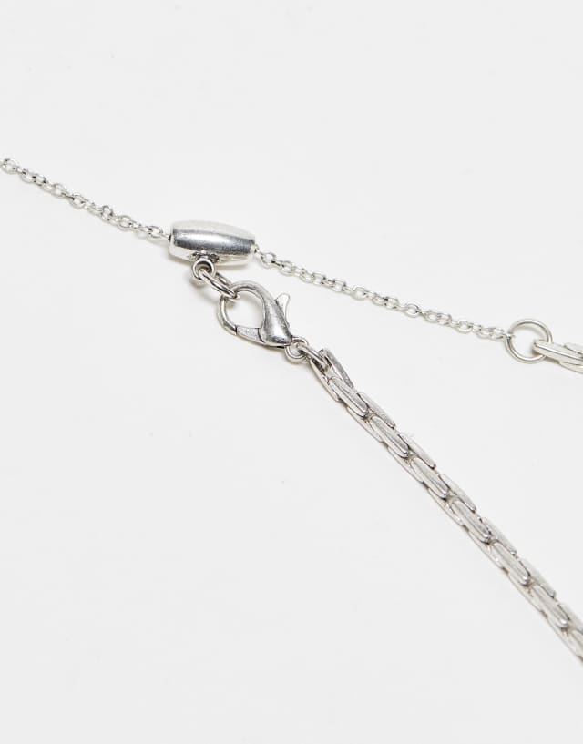Reclaimed Vintage unisex ultimate cross necklace in silver and blue 0