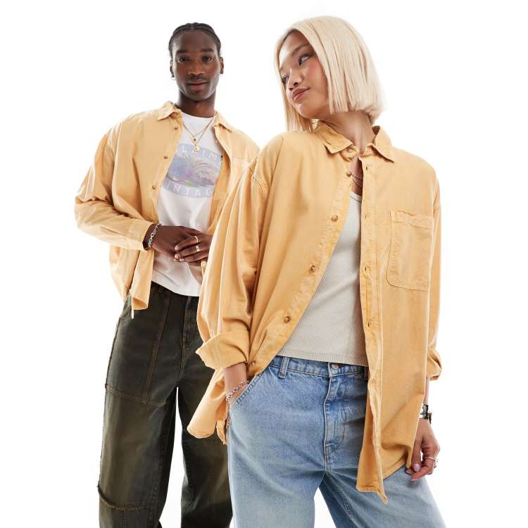 Reclaimed Vintage unisex washed denim shirt in mustard ASOS