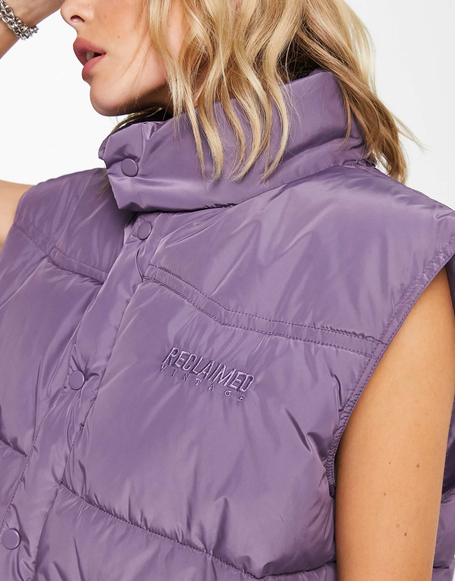 Reclaimed Vintage unisex yoke detail puffer gilet in purple view 3