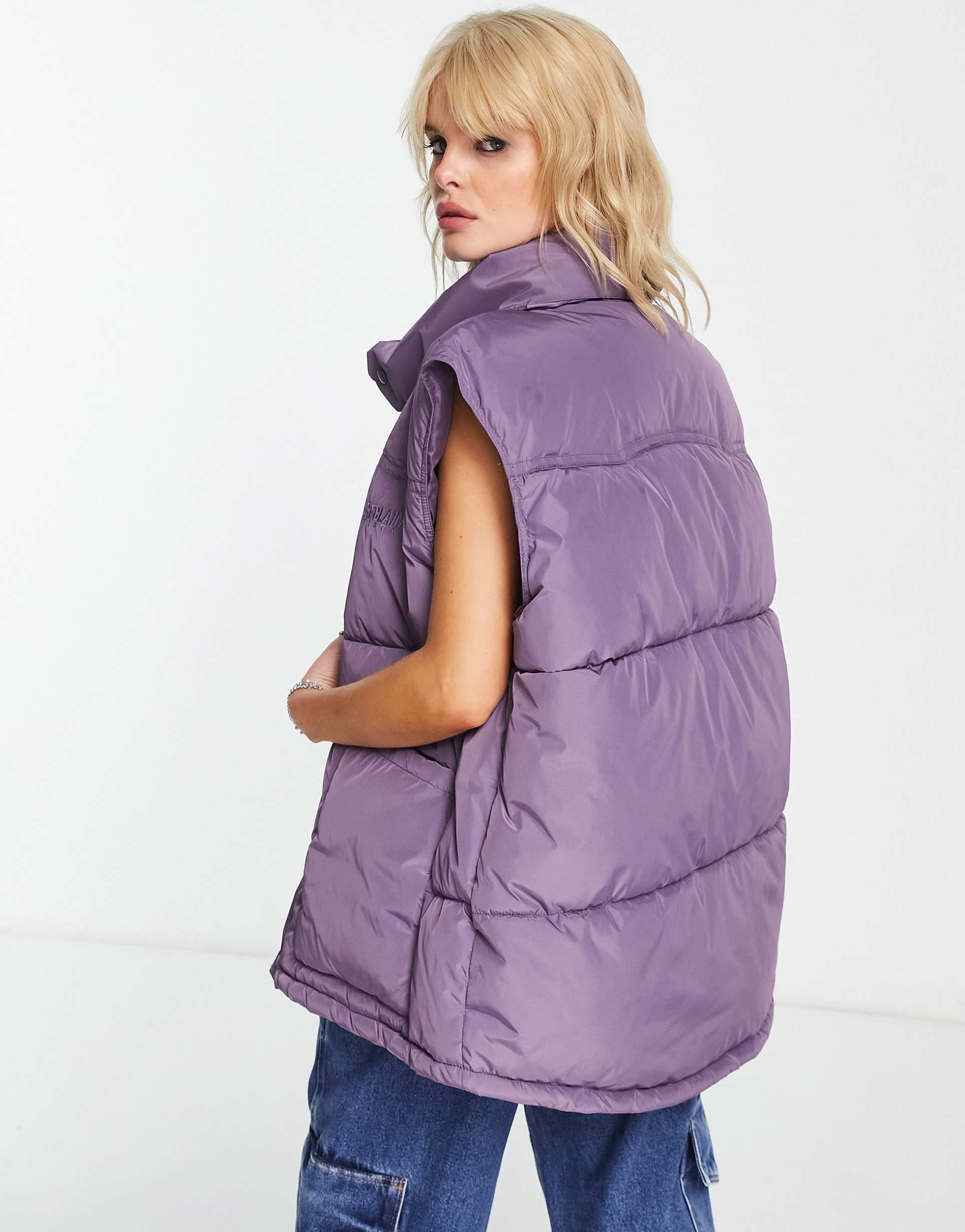 Reclaimed Vintage unisex yoke detail puffer gilet in purple view 4