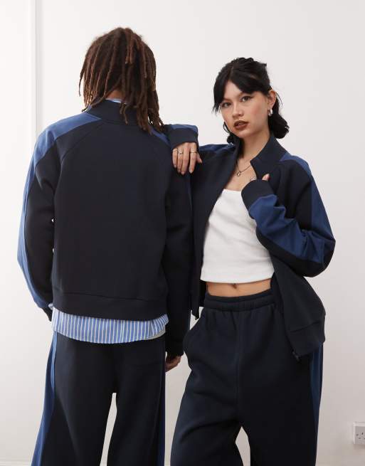 Reclaimed Vintage unisex zip up track jacket in navy ASOS