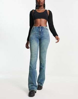 Reclaimed Vintage waistbandless skinny stretch flare in mid wash blue - ASOS Price Checker
