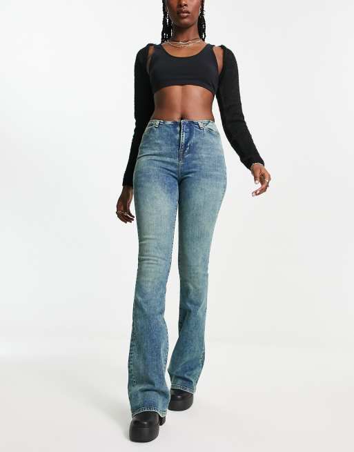Reclaimed Vintage waistbandless skinny stretch flare jeans in mid wash blue