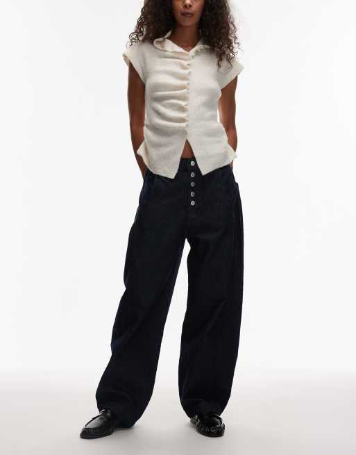 Reclaimed Vintage – Weit geschnittene Jeans in indigoblauer Waschung mit abgerundetem Beinschnitt und Knopfleiste