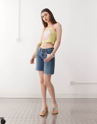 Reclaimed Vintage - Weite Baggy Jeans-Jorts in mittelblauer Waschung