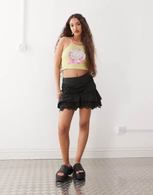 reclaimed vintage western cowgirl mini skirt with lace hem in black