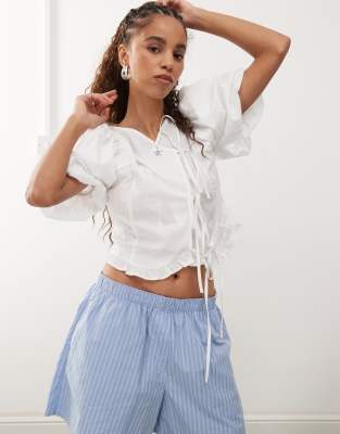 Reclaimed Vintage Reclaimed Vintage western cowgirl top with puff sleeve and tie front in white