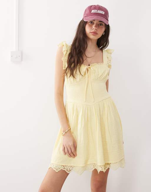 Reclaimed Vintage western summer dress with cinched in waist detail in yellow