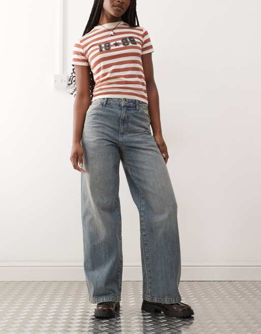 Reclaimed Vintage wide leg jean with embroidered pockets in washed blue ASOS
