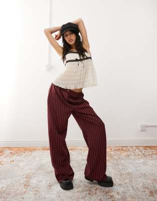 wide leg pants in burgundy pinstripe-Red