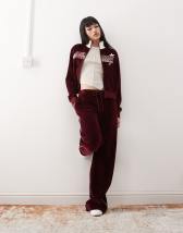 Bershka No Item slogan oversized jogger in beige ASOS