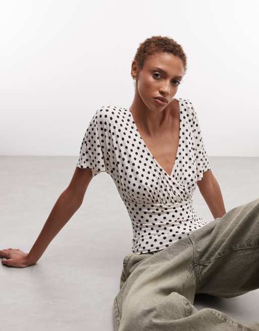 Reclaimed Vintage wrap cinch waist top in micro polka dot