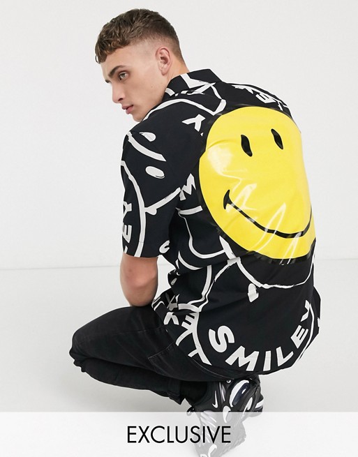 Reclaimed Vintage x Smiley all over print shirt in black