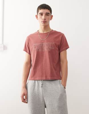 Reclaimed Vintage Reclaimed Vintage x Stranger Things boxy tshirt with embroidered logo in washed red-Multi