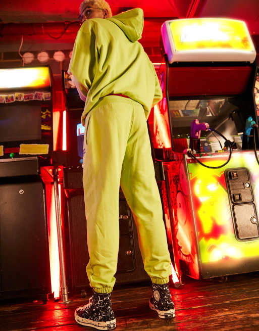 Reclaimed Vintage x Stranger Things unisex jogger in washed yellow