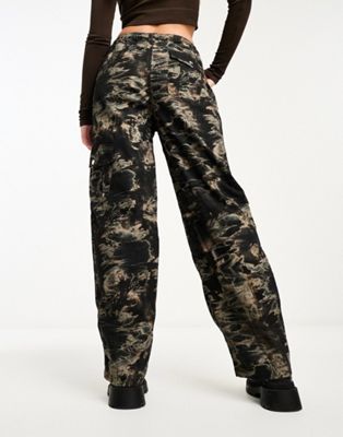 Reclaimed Vintage Revived Camo Cargo Trousers In Orange, $42, Asos