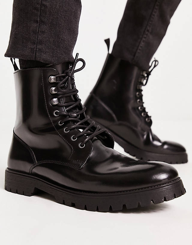 Red Tape - chunky hardware lace up boots in black leather
