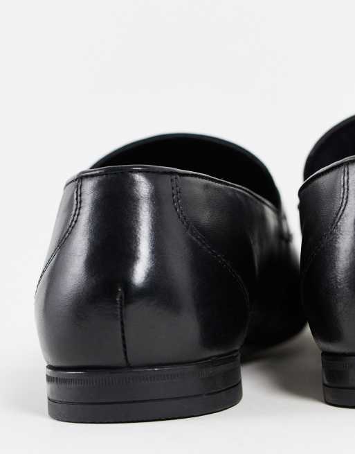 Red Tape metal trim loafers in black leather