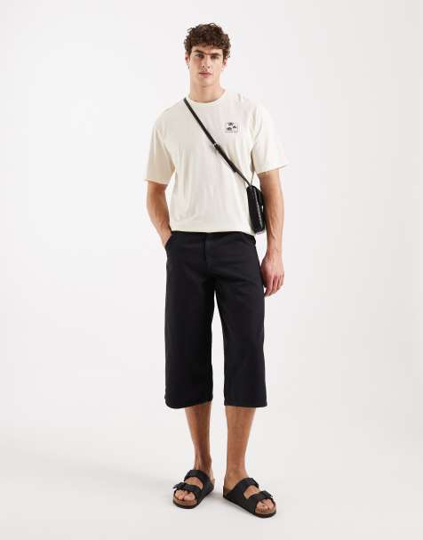Redefinied – Rebel Eddie – Czarne luźne szorty o wydłużonym fasonie z efektem sprania - view 1