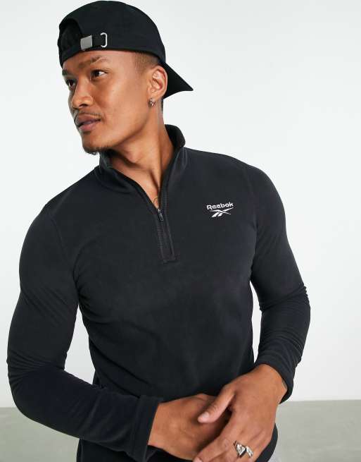 Reebok 1/4 zip fleece in black | ASOS