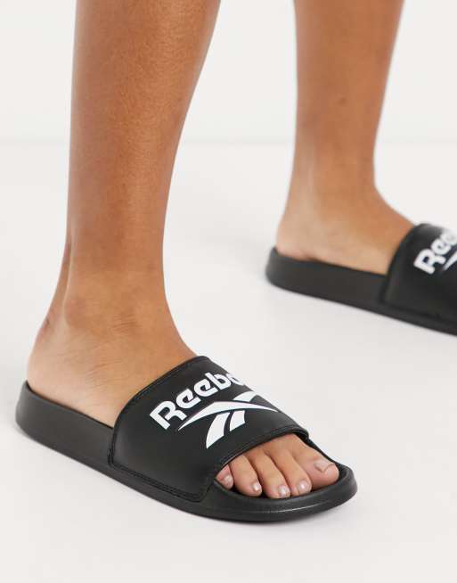 Reebok Claquettes logo Noir ASOS