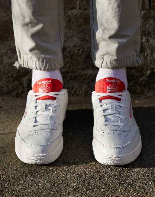 White trainers with red on sale back