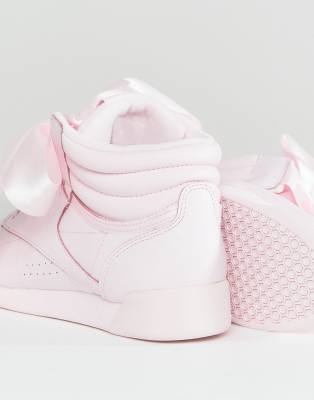 pink reebok high tops