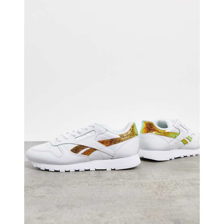 Reebok classic trainers store in snake print leather