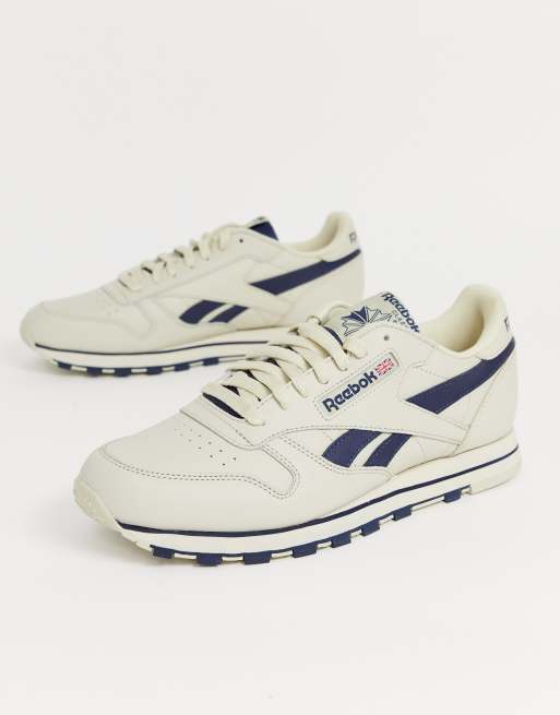 Reebok classic leather sneakers in off white with navy vector | ASOS