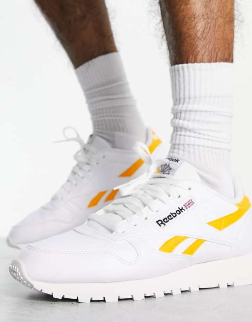 Reebok bianche store e oro