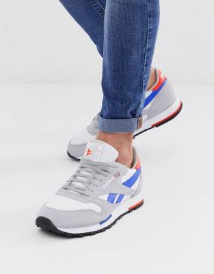 reebok classic leather sneakers in white and blue