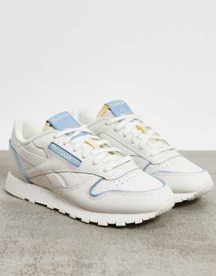 reebok classic leather sneakers in white and blue