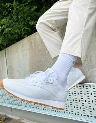 reebok classic white leather trainers with gum sole