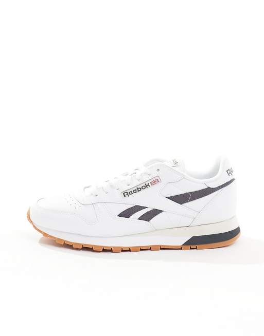 Reebok Classic leather sneakers in with navy ASOS