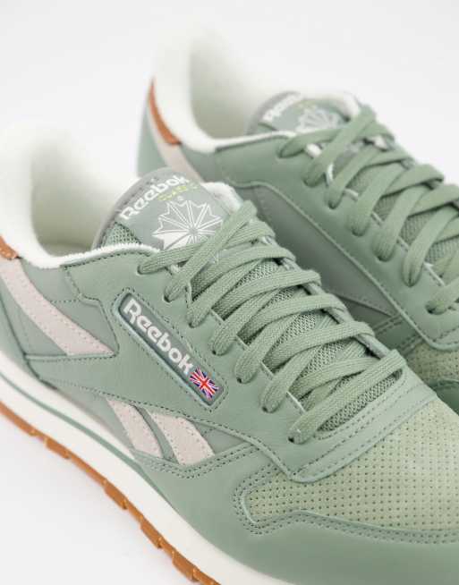 Reebok store green trainers